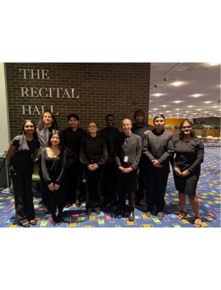  Students standing in music hall 